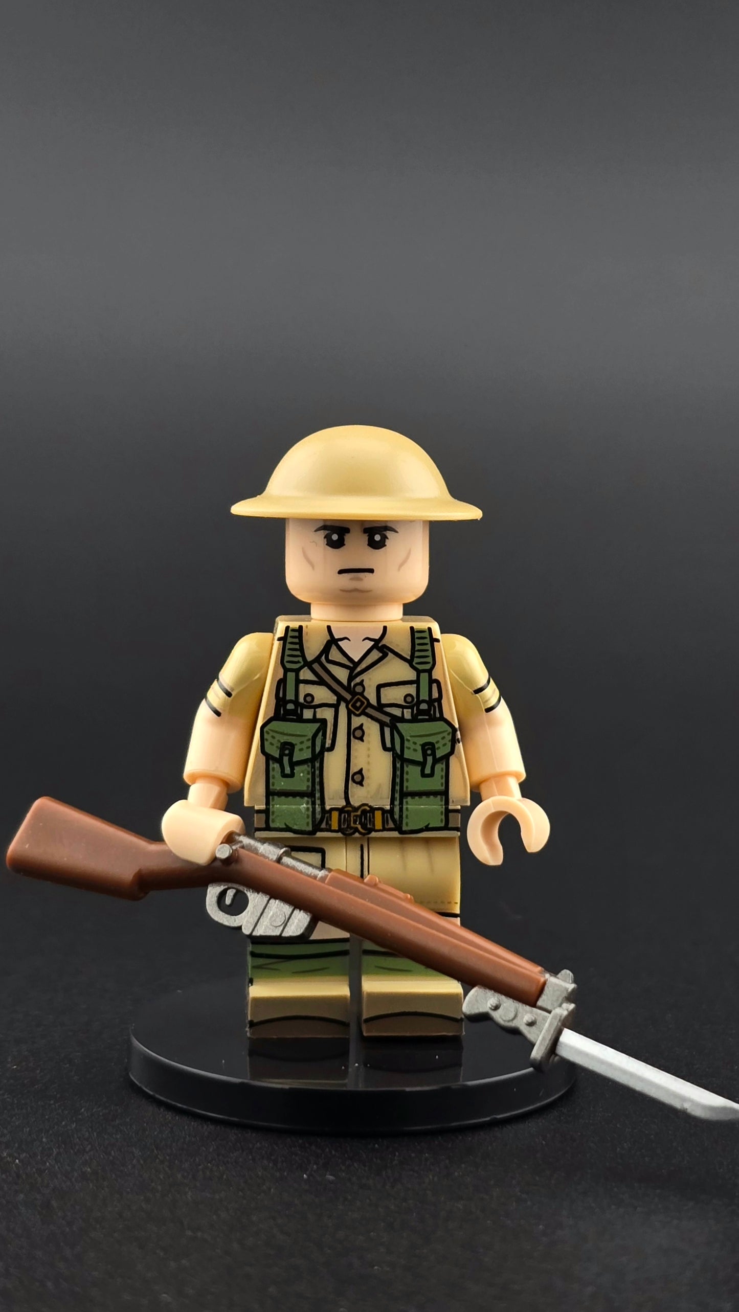 Custom WW2 British SAS minifigure in tan desert uniform with helmet and rifle accessory, detailed with tactical printing and compatible with leading brick-style building systems.