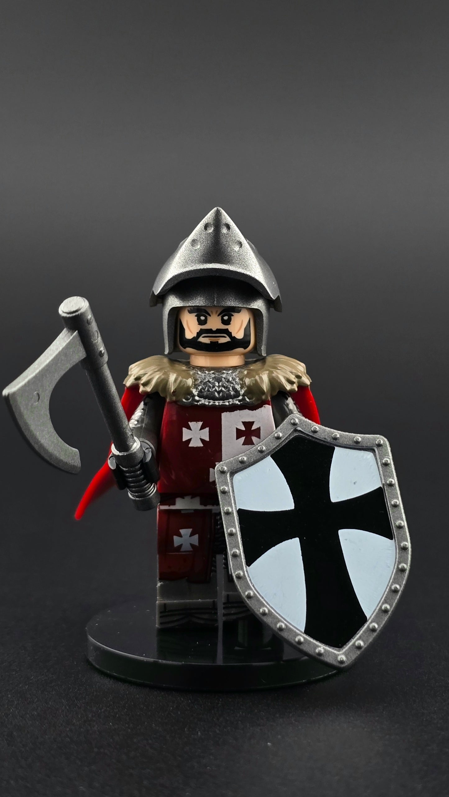 Custom medieval Tripoli Knight minifigure in silver armor with red cape, open bacinet helm, and detailed cross emblem, posed with axe and shield accessories and compatible with leading brick-style systems.