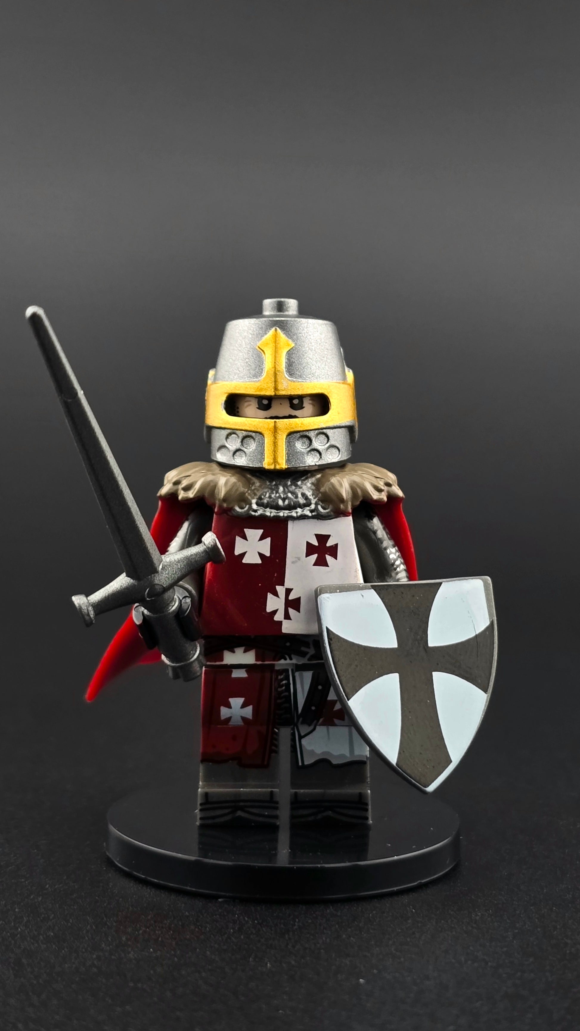 Custom medieval Tripoli Knight minifigure in silver armor with great helmet and red cape, equipped with sword and shield accessories, compatible with leading brick-style building systems.