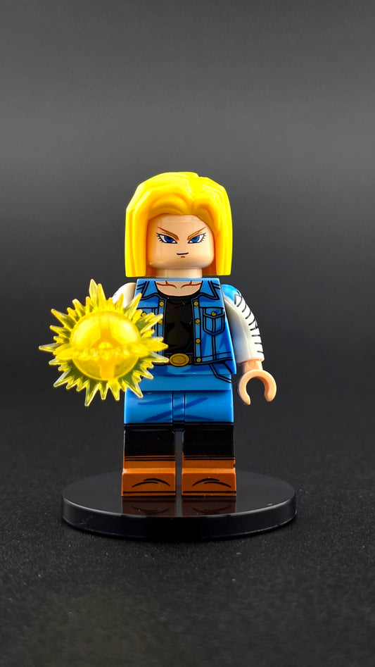 Custom anime inspired Android 18 minifigure with blonde hair, blue and yellow outfit, and energy ball accessory. Detailed fighter themed design compatible with leading brick style building sets.