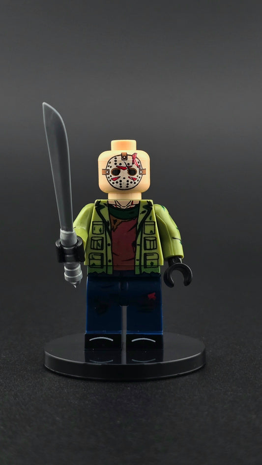 Custom horror inspired Jason style minifigure with green and blue outfit, iconic mask, and machete accessory. Detailed slasher themed design compatible with leading brick style building sets.