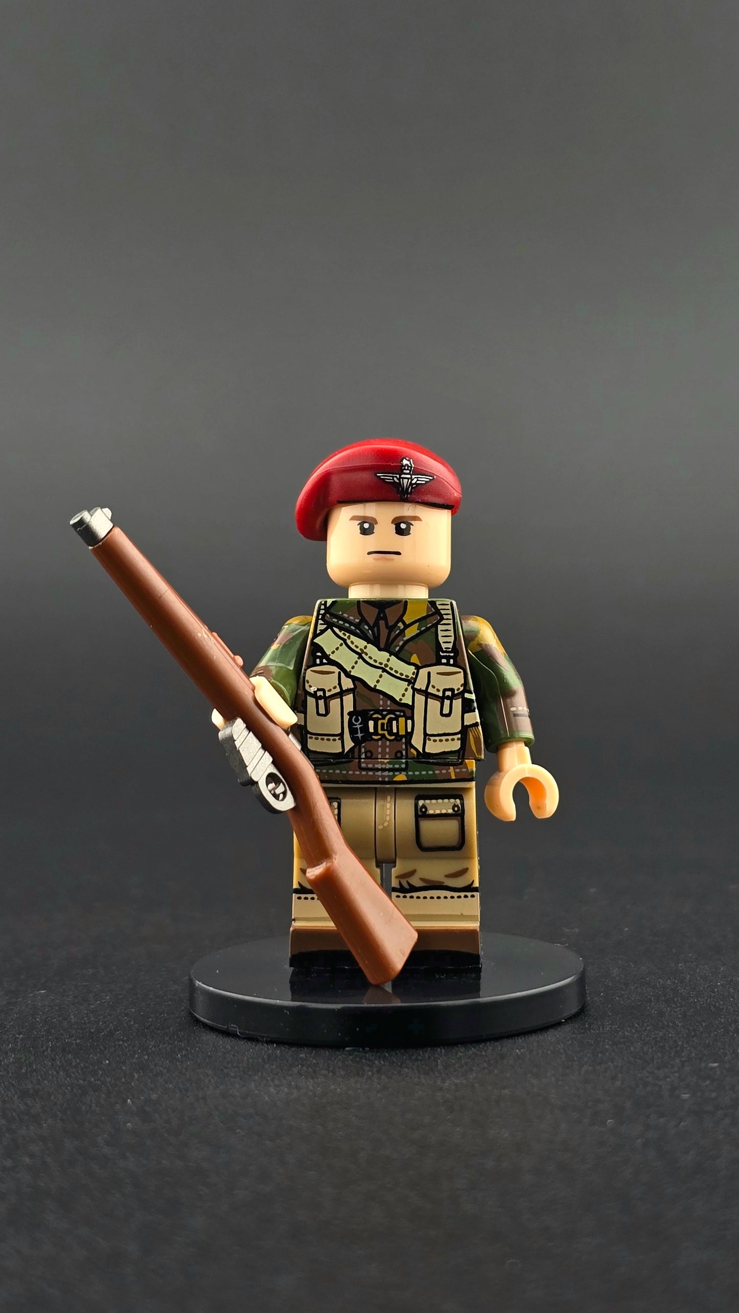 Custom WWII British Red Devil Paratrooper minifigure wearing detailed airborne uniform with red beret and rifle, compatible with leading brick-style building systems.