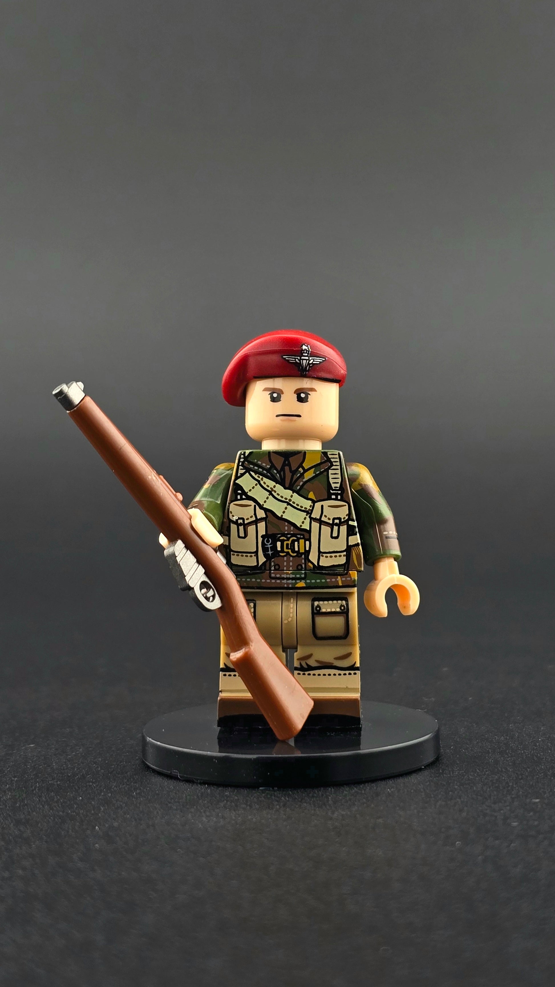 Custom WWII British Red Devil Paratrooper minifigure wearing detailed airborne uniform with red beret and rifle, compatible with leading brick-style building systems.