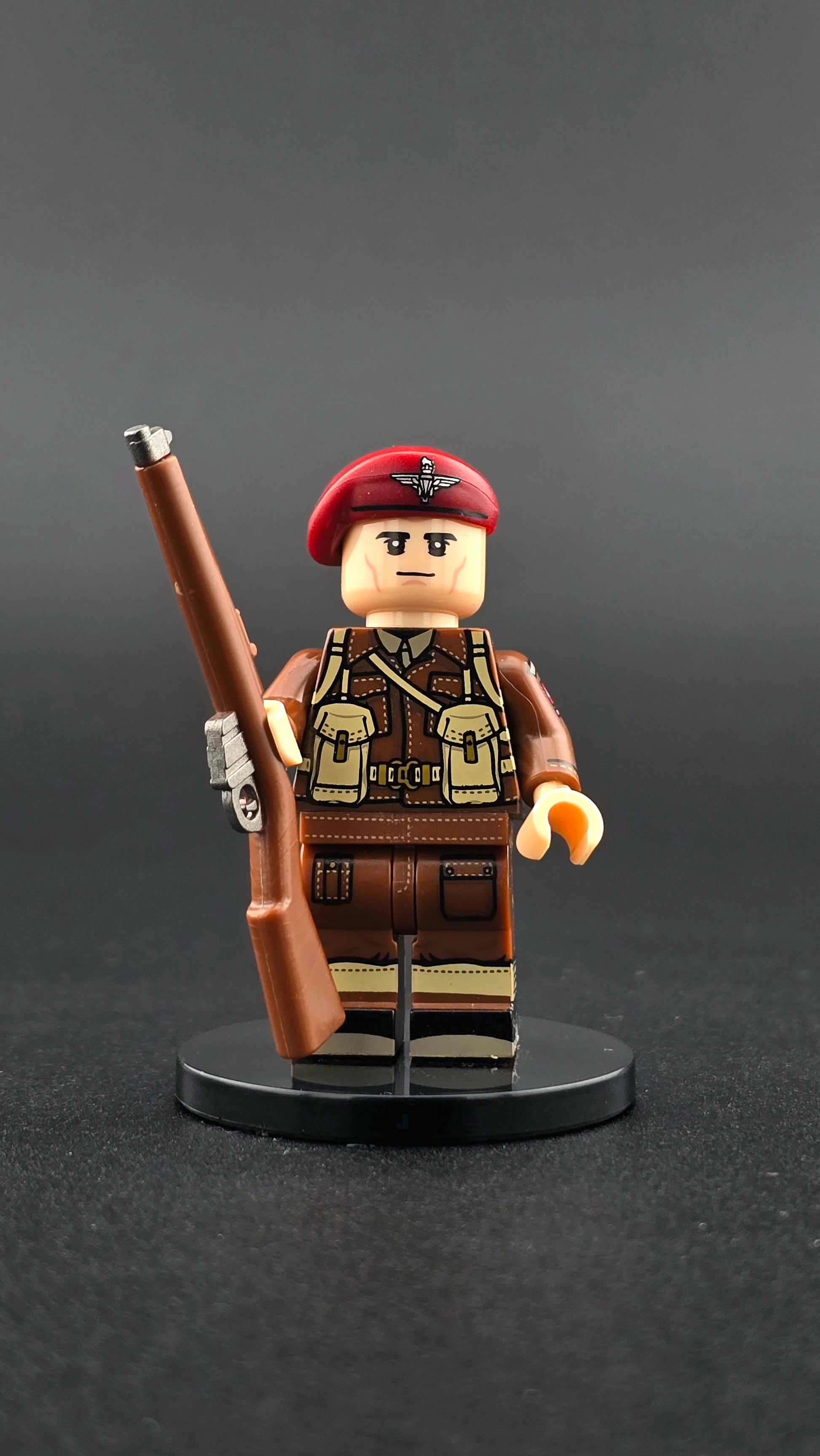 Custom WWII British Red Devil Officer minifigure wearing detailed airborne officer uniform with red beret and rifle, compatible with leading brick-style building systems.