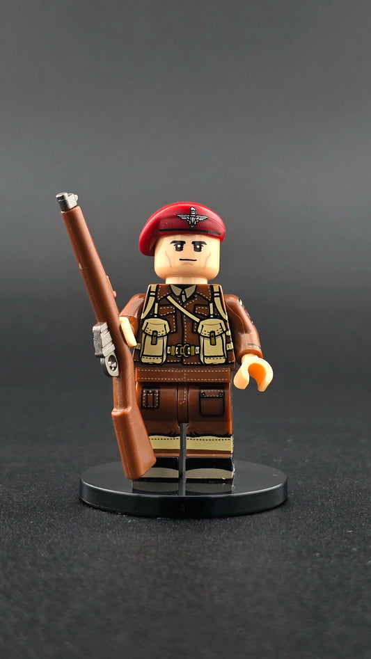 Custom WWII British Red Devil Officer minifigure wearing detailed airborne officer uniform with red beret and rifle, compatible with leading brick-style building systems.